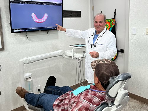 Dr. Babineau and Patient in treatment room
